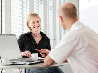 man coaching woman "When and where are you going to do that?"